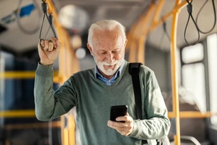 Older man using a phone