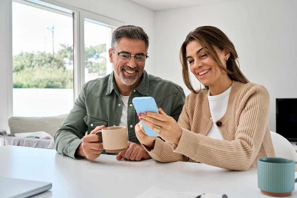 Couple looking at a phone together